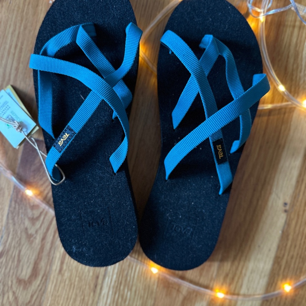 Teva Blue and Black Sandals with Crisscross Straps